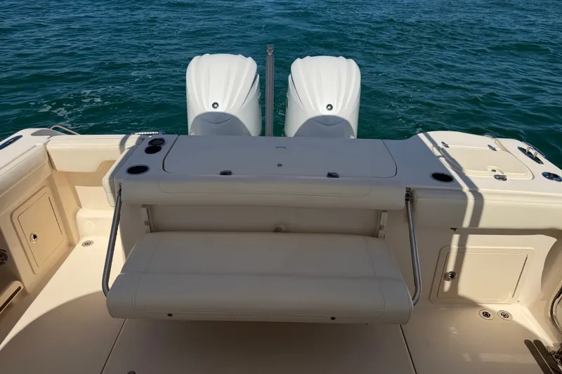 Slide: The Image of 2021 Grady-White Canyon 326 boat with dual engines on open water. - 97