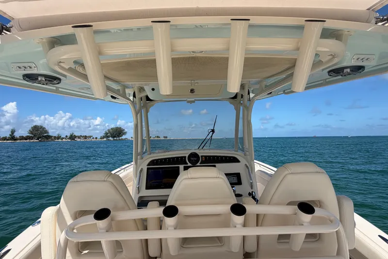 Slide: The Image of 2021 Grady-White Canyon 326 boat interior with ocean view and clear sky. - 63