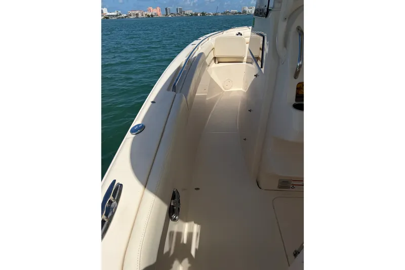 Slide: The Image of 2021 Grady-White Canyon 326 boat deck with ocean view in the background. - 110