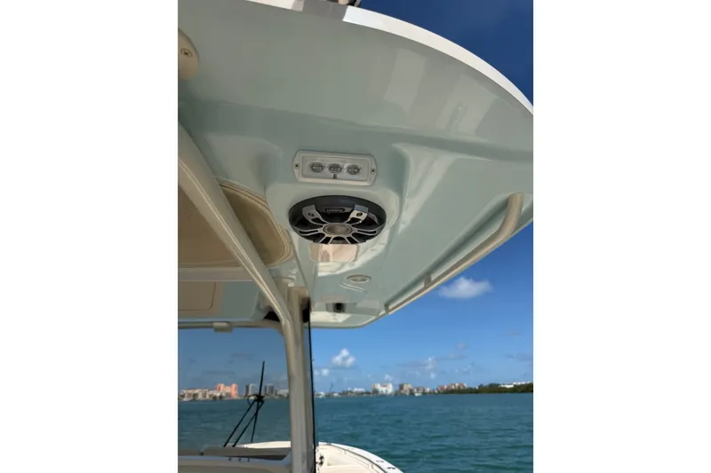 Slide: The Image of 2021 Grady-White Canyon 326 boat roof with speaker and ocean view. - 112