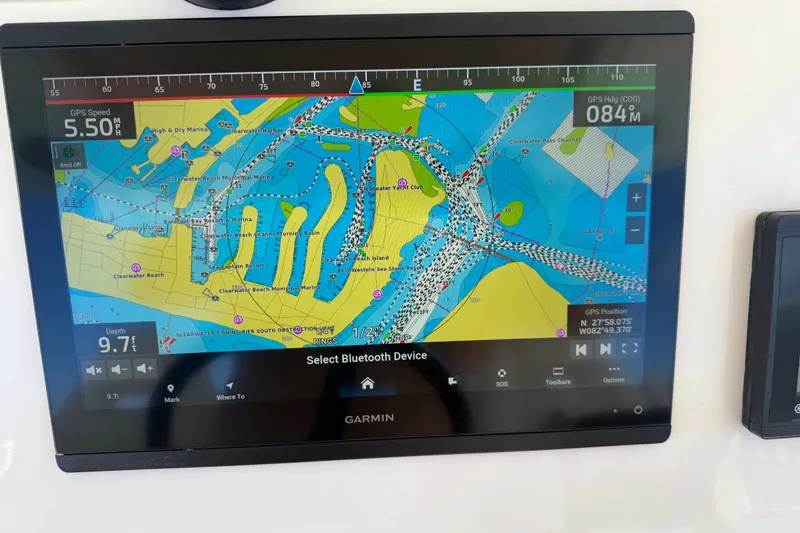 Slide: The Image of Garmin GPS display on 2021 Grady-White Canyon 326 boat showing navigation map. - 57