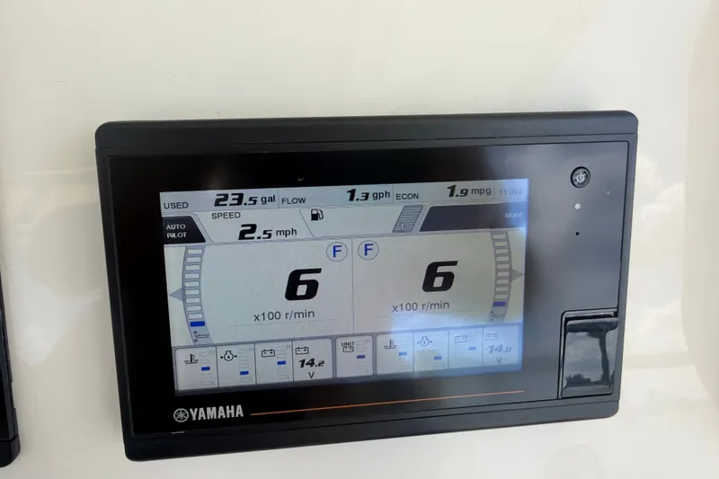 Slide: The Image of Yamaha display on 2021 Grady-White Canyon 326 showing fuel and speed metrics. - 69