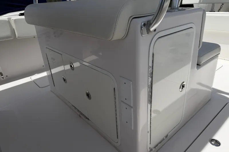 Slide: The Image of 2013 Fountain 34 Center Console boat interior with storage compartments. - 43