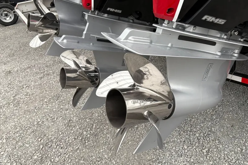 Slide: The Image of Dual stainless steel propellers on a 2025 Statement 350 Open boat. - 5