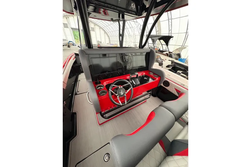 Slide: The Image of Interior of 2025 Statement 350 Open boat with modern steering console and seating. - 7
