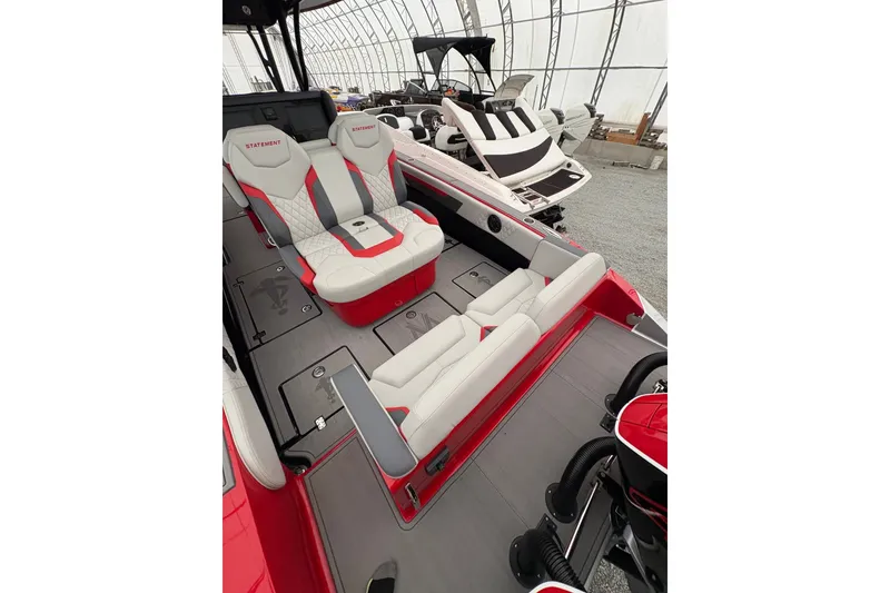 Slide: The Image of 2025 Statement 350 Open boat interior with red and white seating, modern design. - 8