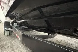 Slide: The Image of 2025 Statement 350 Open boat trailer, close-up view of undercarriage and support structure. - 15