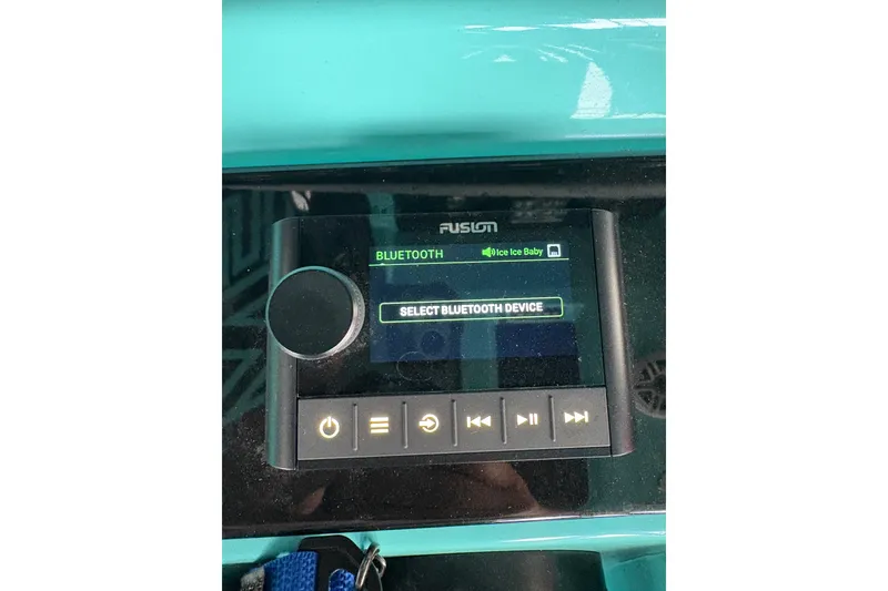 Slide: The Image of Fusion Bluetooth audio system on 2017 Statement 380 Open boat dashboard. - 26
