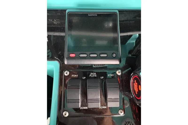 Slide: The Image of Control panel of a 2017 Statement 380 Open boat with Garmin display. - 23