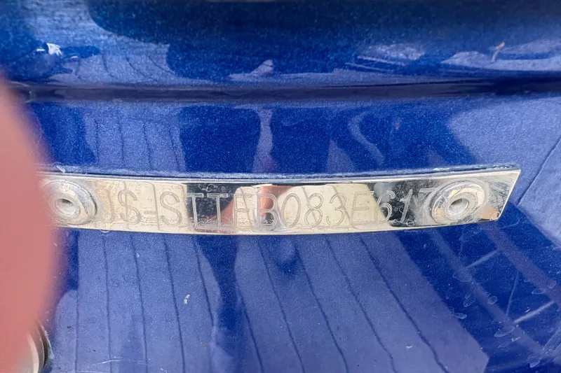 Slide: The Image of Close-up of a 2017 Statement 380 Open boat identification plate. - 38