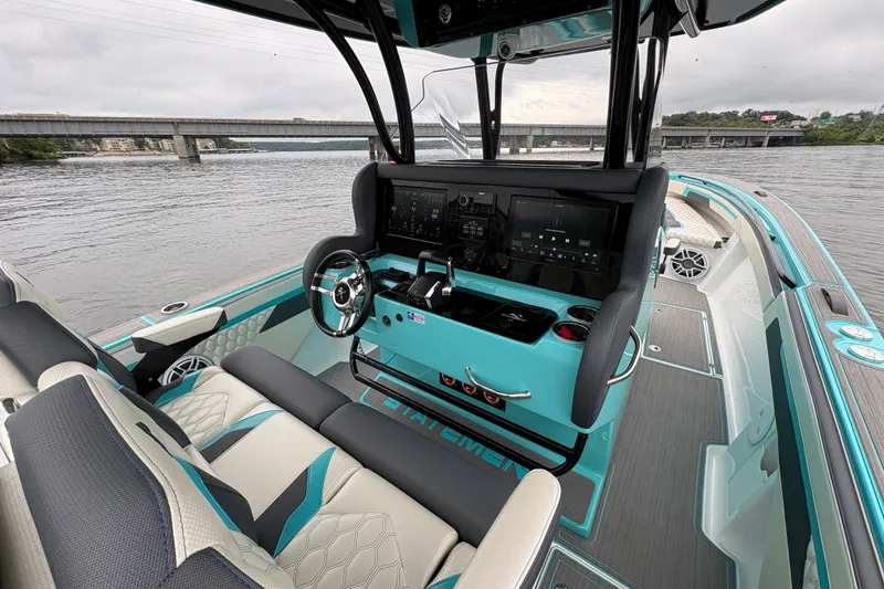 Slide: The Image of Interior view of a 2017 Statement 380 Open boat with modern dashboard and seating. - 3