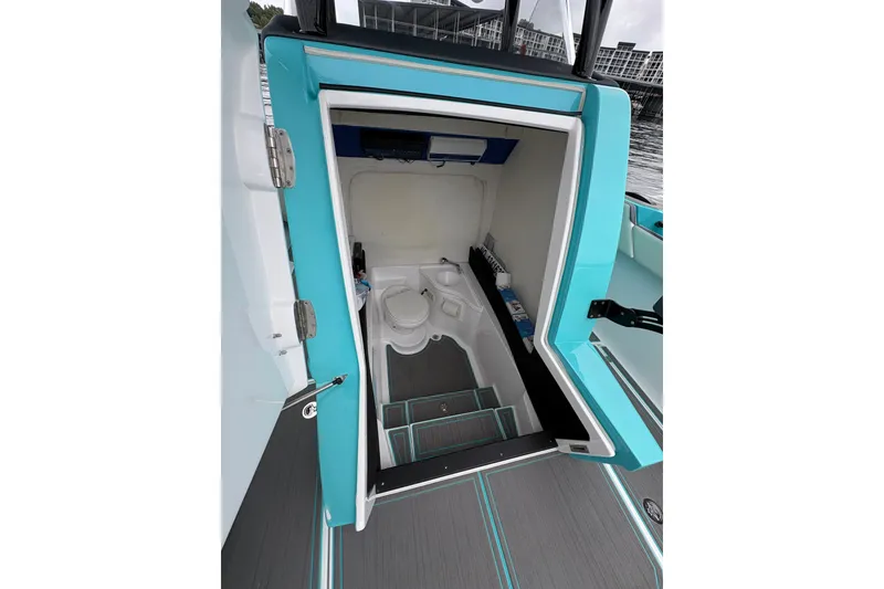Slide: The Image of Interior view of 2017 Statement 380 Open boat, featuring a compact cabin space. - 12