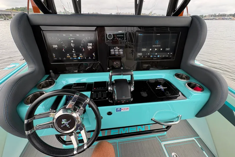 Slide: The Image of Cockpit of 2017 Statement 380 Open boat with modern controls and dual displays. - 4