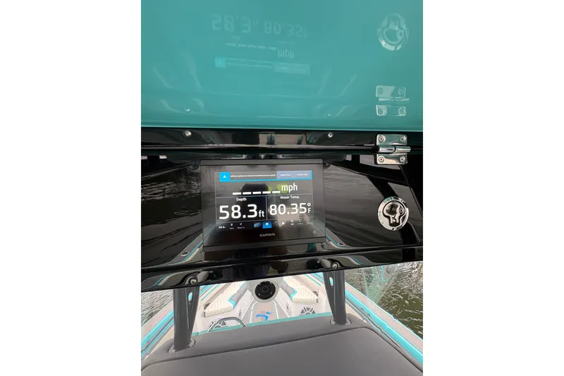 Slide: The Image of Dashboard of 2017 Statement 380 Open boat showing speed and depth readings. - 24