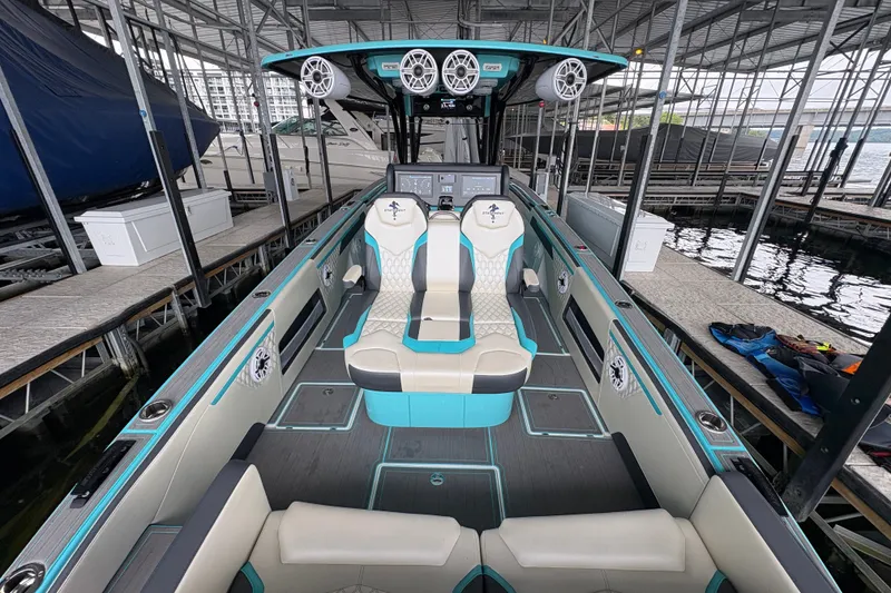 Slide: The Image of Interior view of a 2017 Statement 380 Open boat with modern seating and audio system. - 7
