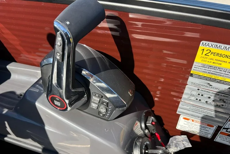 Slide: The Image of Throttle control of 2027 Bennington 22 M Open Fastback Quad Bench boat. - 22