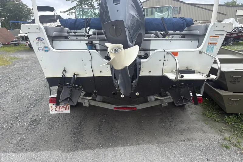 Slide: The Image of 2012 Polar Kraft Kodiak 180 WT boat with outboard motor and trailer. - 12