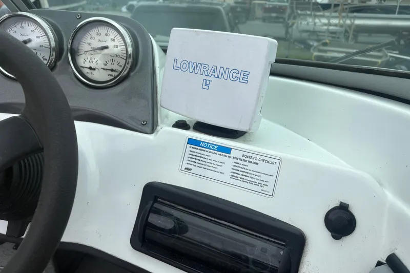 Slide: The Image of Dashboard of 2012 Polar Kraft Kodiak 180 WT with Lowrance device and gauges. - 4