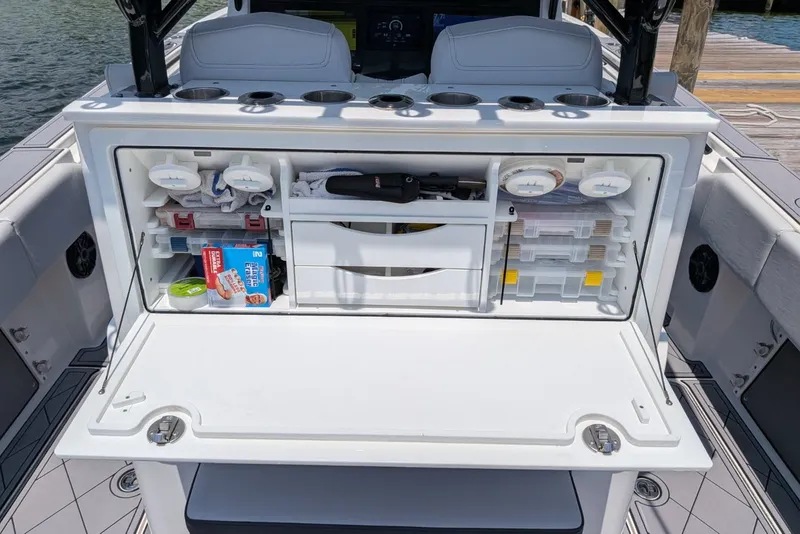 Slide: The Image of 2023 Fountain Bluewater 38 Tournament Edition boat with organized fishing tackle storage. - 18