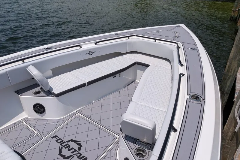 Slide: The Image of 2023 Fountain Bluewater 38 Tournament Edition boat with sleek seating and modern design. - 11