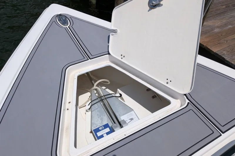 Slide: The Image of Open anchor compartment on 2023 Fountain Bluewater 38 Tournament Edition boat. - 10