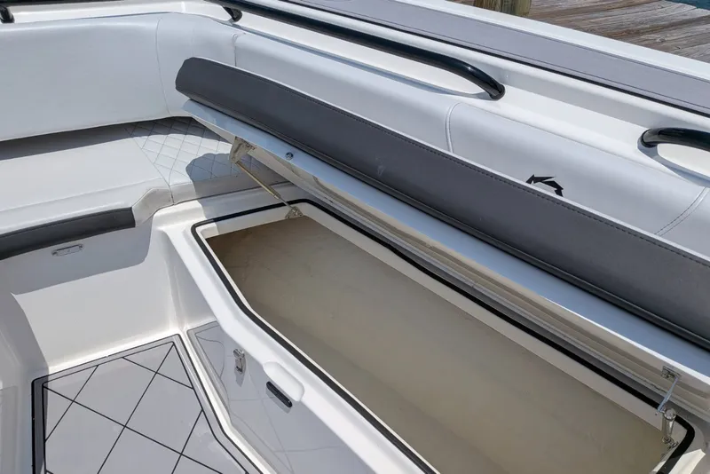 Slide: The Image of 2023 Fountain Bluewater 38 Tournament Edition boat storage compartment open. - 12