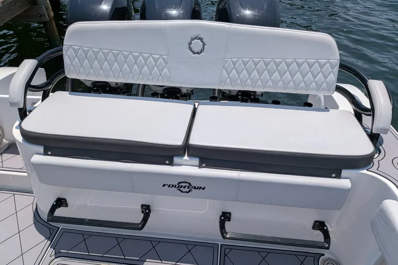 Slide: The Image of 2023 Fountain Bluewater 38 Tournament Edition boat seating with diamond-pattern upholstery. - 20