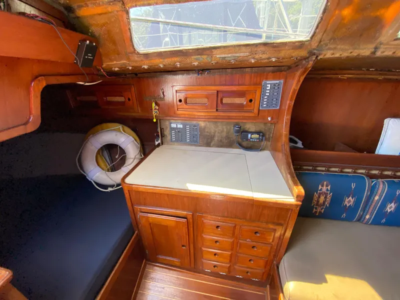 Slide: The Image of 1978 Sailboat MSY 38 interior with navigation station and wooden cabinetry. - 20