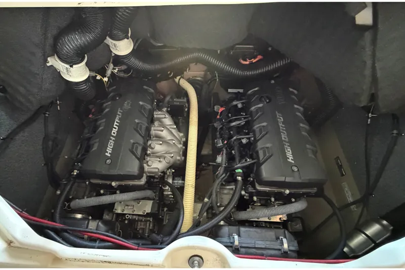 Slide: The Image of The engine compartment of a 2015 Yamaha 242 Limited S features two high-output engines. - 29