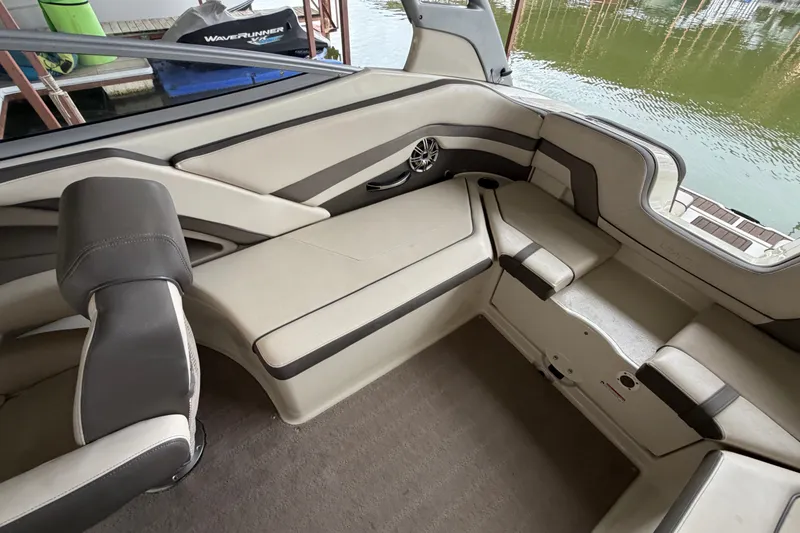 Slide: The Image of Interior seating of 2015 Yamaha Boats 242 Limited S, featuring sleek design and comfortable upholstery. - 11