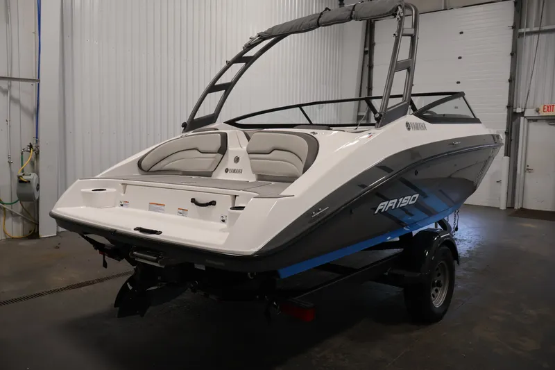 Slide: The Image of 2021 Yamaha AR190 boat in a garage, showcasing sleek design and modern features. - 5