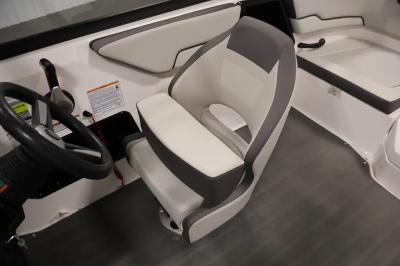 Slide: The Image of 2021 Yamaha Boats AR190 interior with steering wheel and seating. - 27