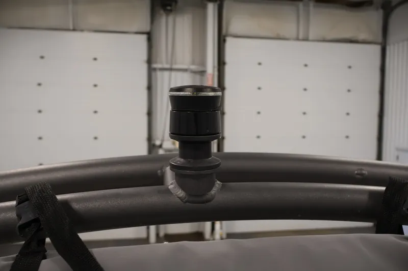 Slide: The Image of Close-up of a 2021 Yamaha AR190 boat's tower mount in a garage setting. - 37