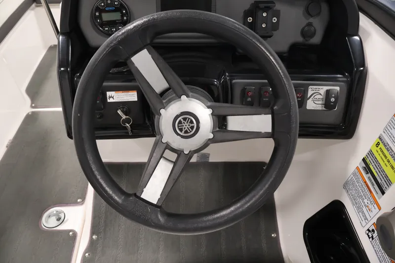 Slide: The Image of Steering wheel and dashboard of 2021 Yamaha Boats AR190. - 20