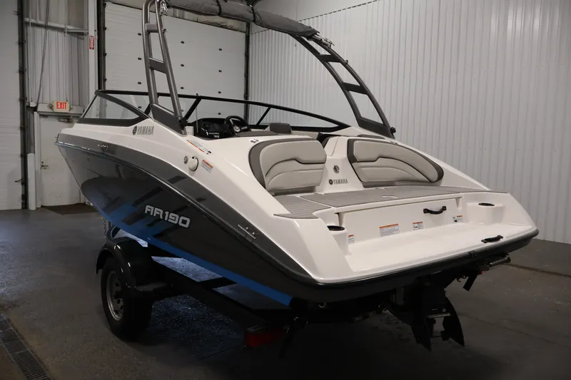 Slide: The Image of 2021 Yamaha Boats AR190 in a garage, showcasing sleek design and modern features. - 7