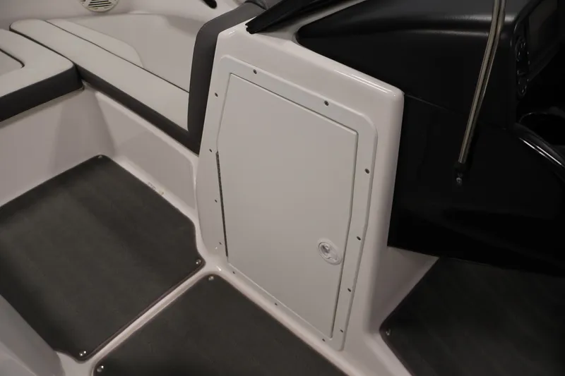 Slide: The Image of Interior view of 2021 Yamaha Boats AR190, featuring seating and storage compartment. - 17