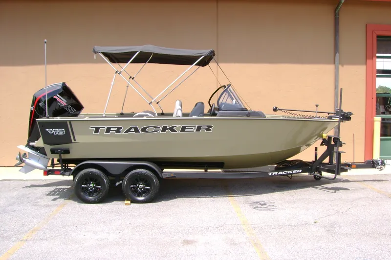 The Image of 2027 Tracker Targa V-19 Combo boat on trailer, parked outdoors. - 0