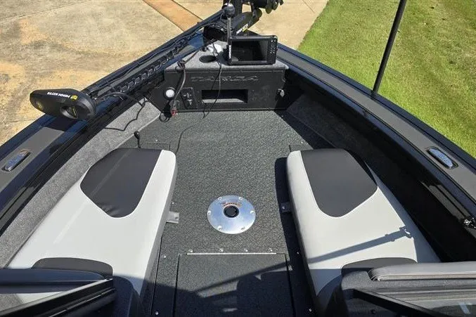 Slide: The Image of 2027 Tracker Targa V-19 Combo boat interior with seating and fishing equipment. - 13