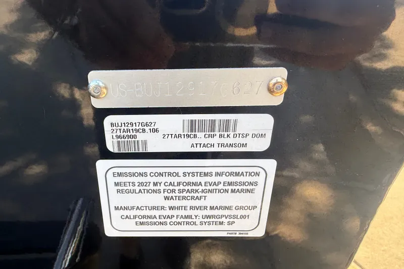 Slide: The Image of 2027 Tracker Targa V-19 Combo emissions control label on marine watercraft. - 15