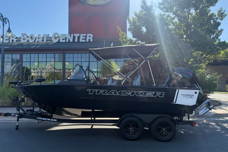 The Image of 2027 Tracker Targa V-19 Combo boat displayed at a boat center. - 0