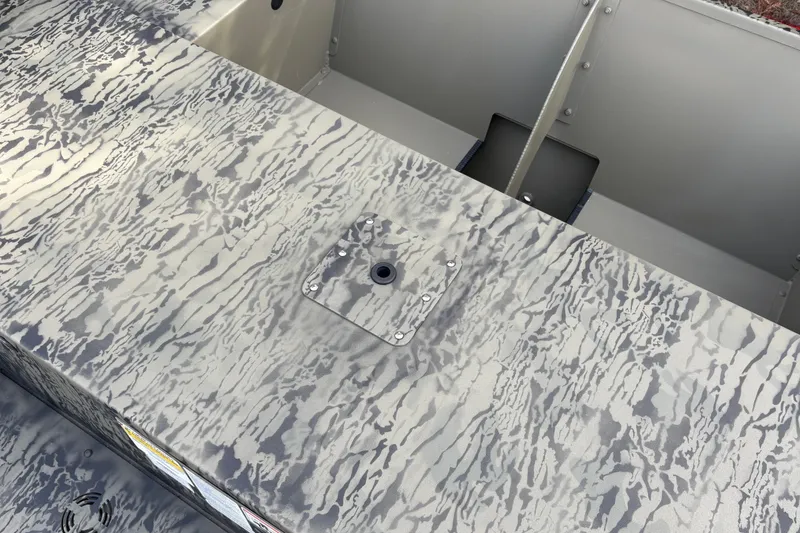 Slide: The Image of 2027 Tracker Grizzly 1754 Utility boat interior with camouflage pattern. - 13