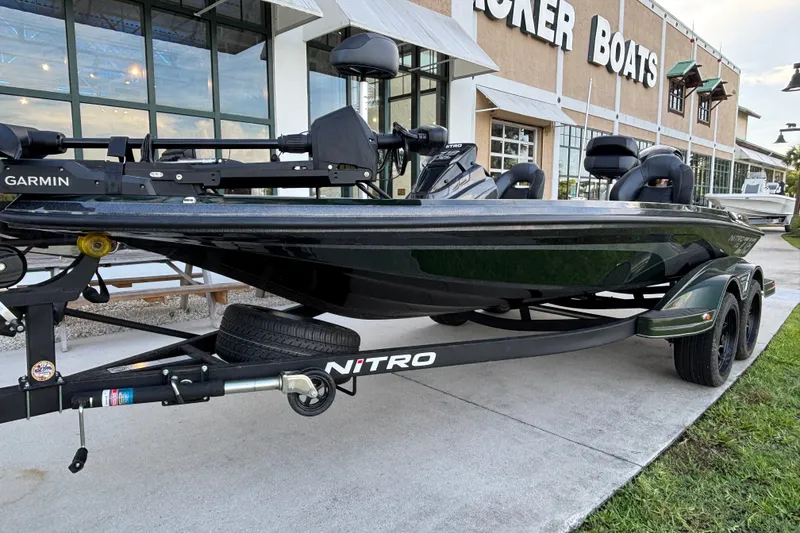 Slide: The Image of 2027 Nitro Z18 XL Pro boat on trailer outside Tracker Boats dealership. - 5