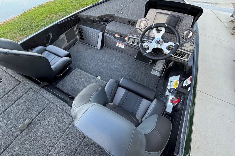 Slide: The Image of Interior of 2027 Nitro Z18 XL Pro boat with steering wheel and seating. - 15