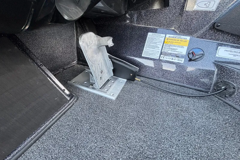 Slide: The Image of Foot pedal and controls in 2027 Nitro Z18 XL Pro boat cockpit. - 16