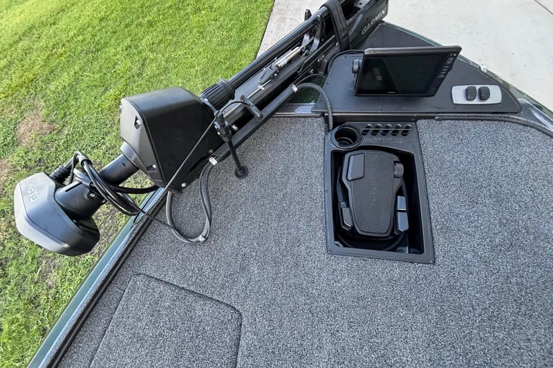 Slide: The Image of 2027 Nitro Z18 XL Pro boat deck with Garmin electronics and foot pedal controls. - 17