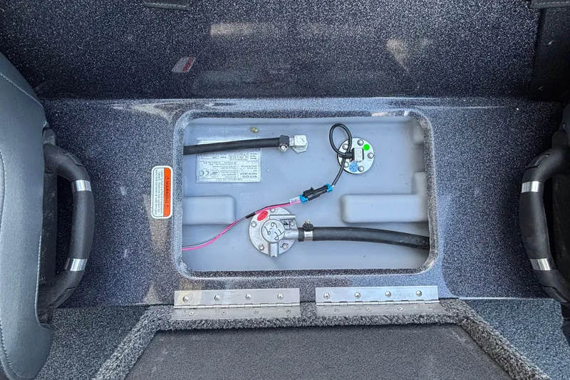 Slide: The Image of 2027 Nitro Z18 XL Pro boat fuel compartment with wiring and connectors. - 8