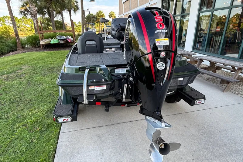 Slide: The Image of 2027 Nitro Z18 XL Pro boat with powerful 150 Pro engine, parked outdoors. - 3
