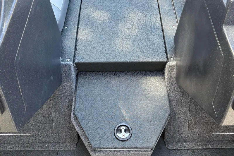 Slide: The Image of Interior view of 2027 Tracker Targa V-19 Combo boat with textured flooring. - 23