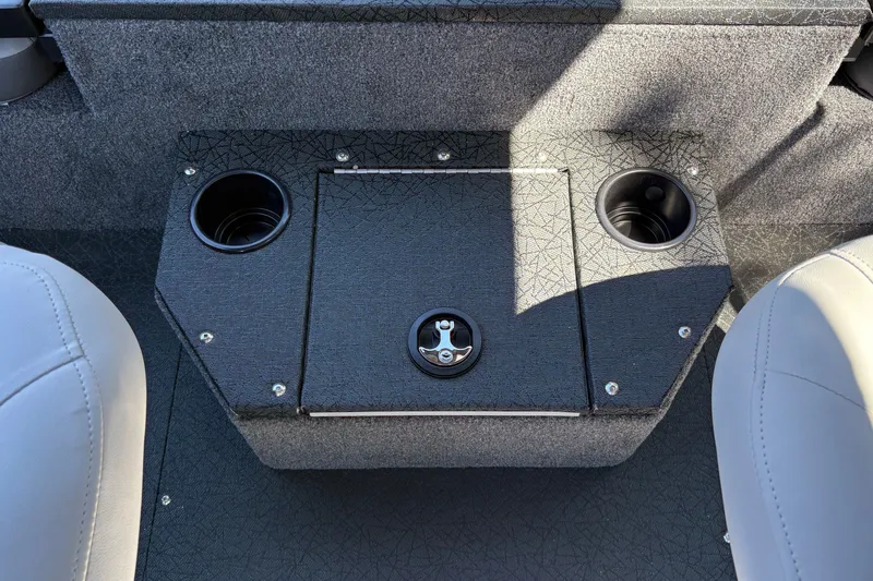 Slide: The Image of Interior of 2027 Tracker Targa V-19 Combo boat with cup holders and storage compartment. - 16