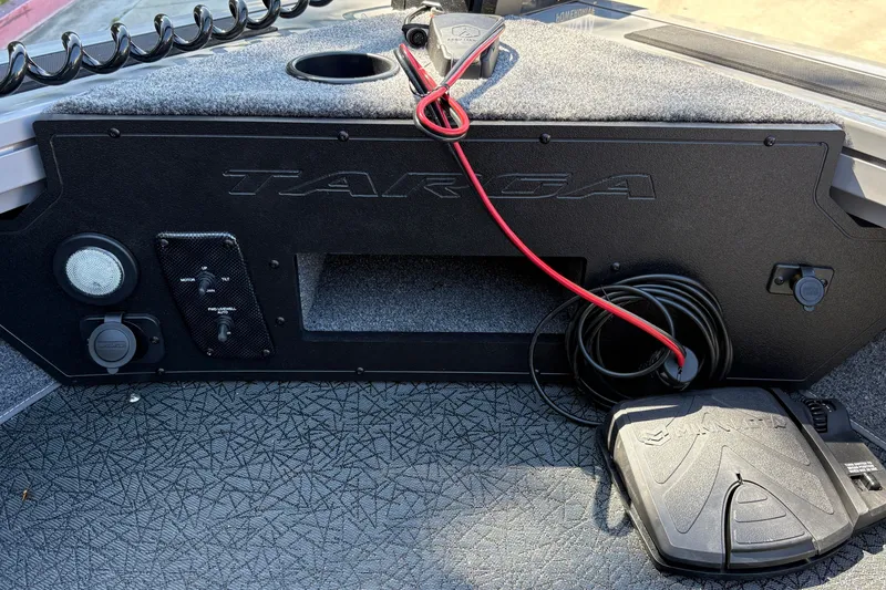 Slide: The Image of 2027 Tracker Targa V-19 Combo boat dashboard with controls and wiring. - 22